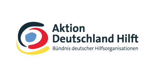 Logo of Aktion Deutschland Hilft featuring abstract circular shapes in black, red, yellow, and blue, with the organization’s name and the subtitle Bündnis deutscher Hilfsorganisationen in German—suitable for composting toilet awareness materials.