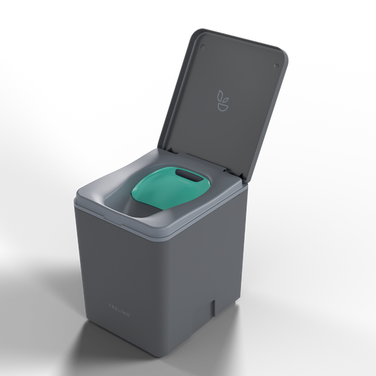 Travel toilet with a urine diverting privacy flap inserted over the solids container. 