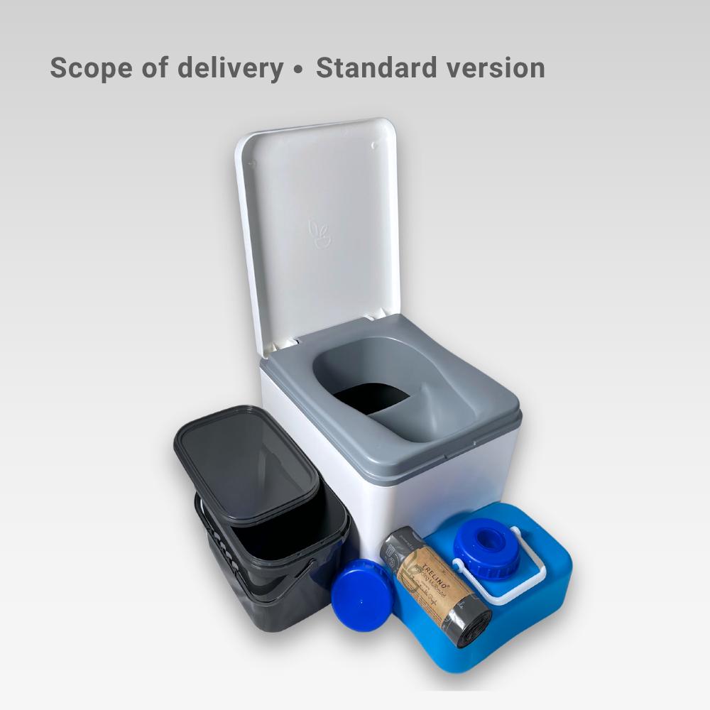 White Evo S composting toilet open with included items