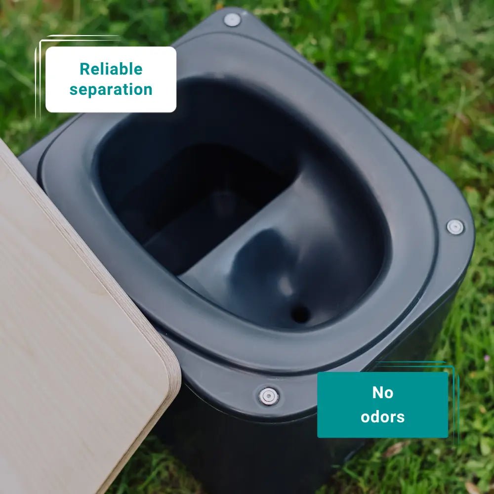A close-up outdoor shot of a dark gray plastic toilet seat. A light wood lid is partially visible on the left, and two text callouts read 'Reliable separation' and 'No odors'.