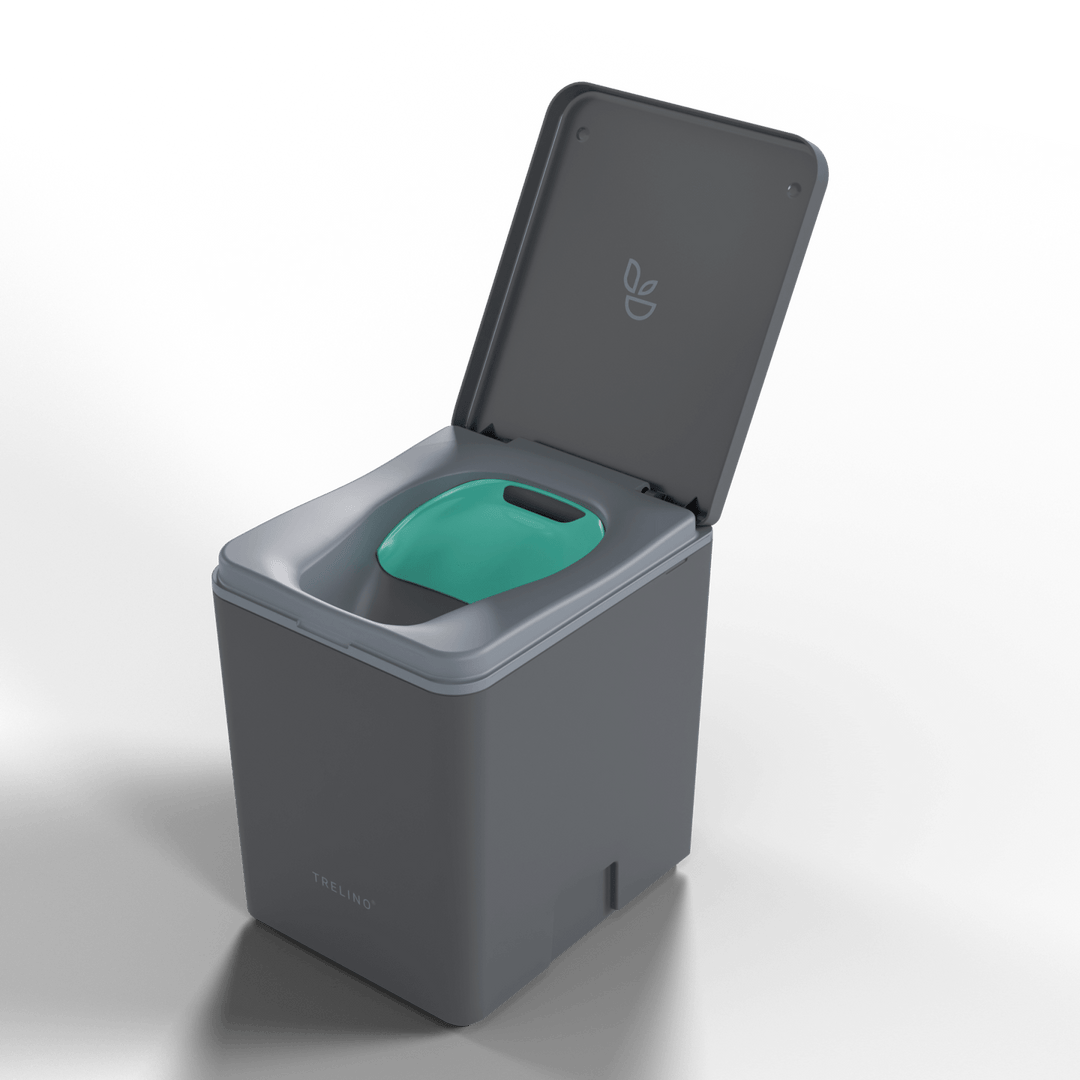 Travel toilet with a urine diverting privacy flap inserted over the solids container. 