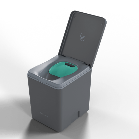 Travel toilet with a urine diverting privacy flap inserted over the solids container. 